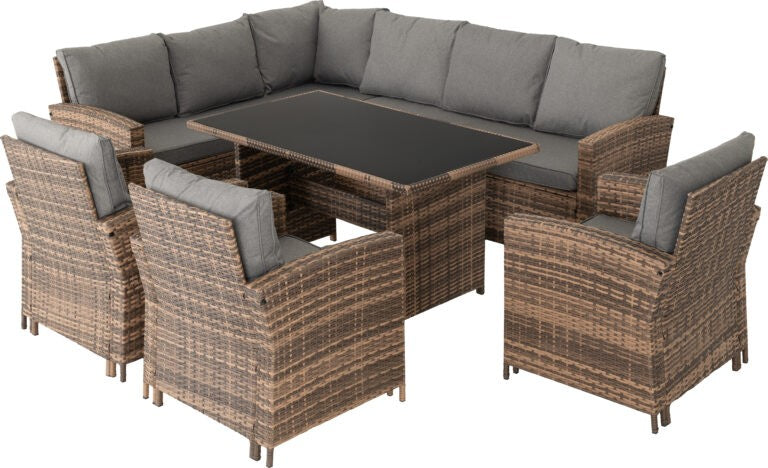 Outdoor furniture set with wicker chairs and table on a white background