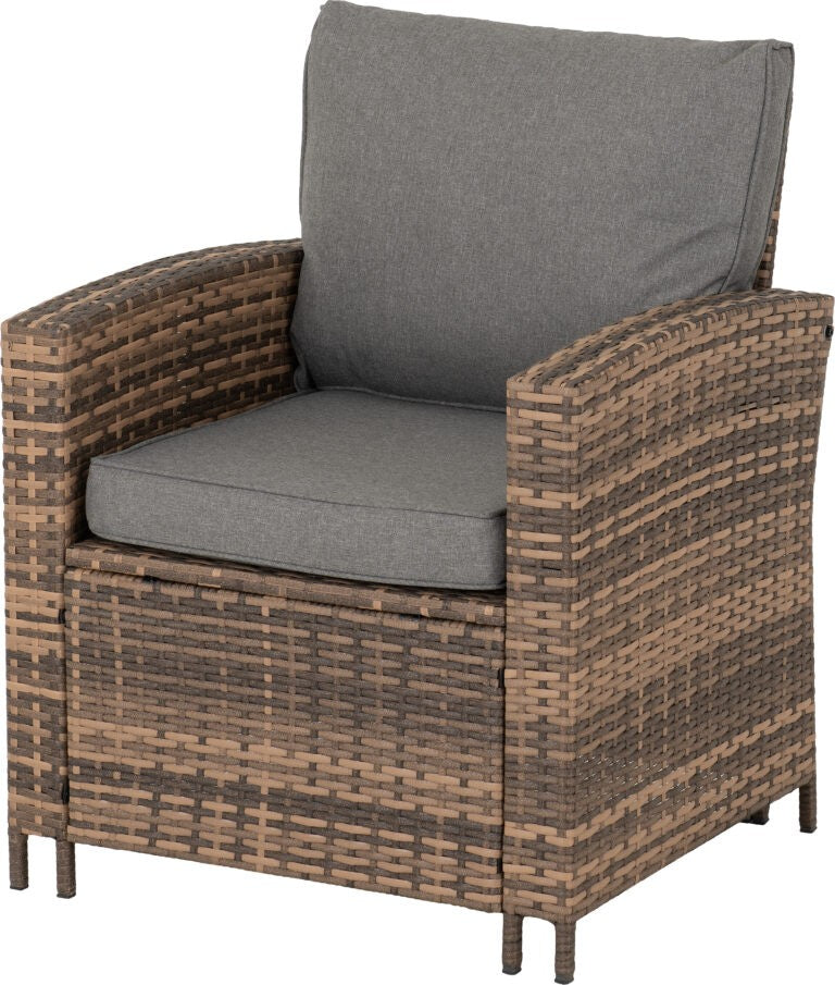 Wicker chair with gray cushions on a white background
