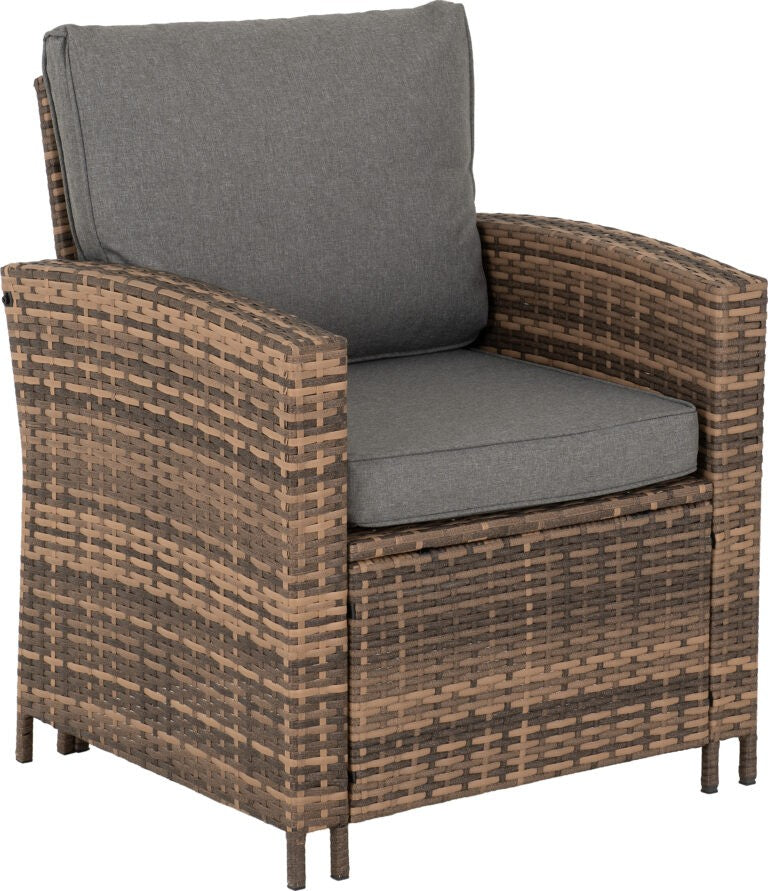 Wicker armchair with gray cushions on a white background