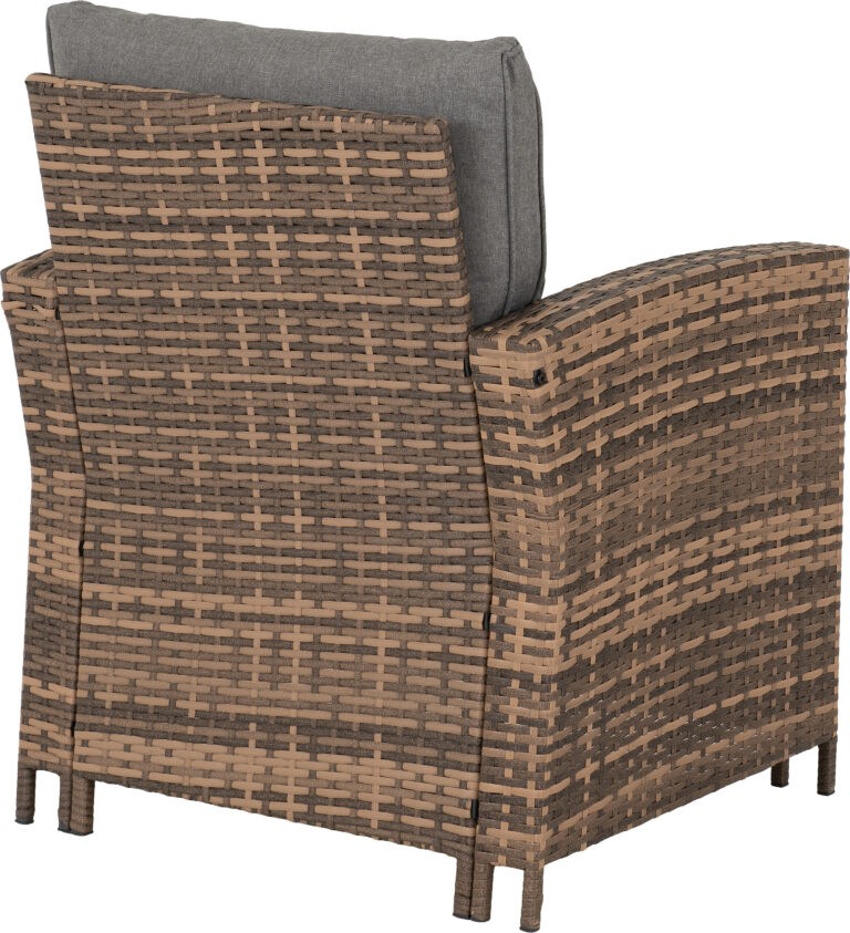 Brown wicker armchair with a gray cushion on a white background