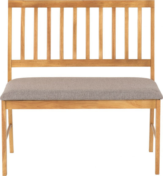 Wooden bench with a gray cushion on a white background