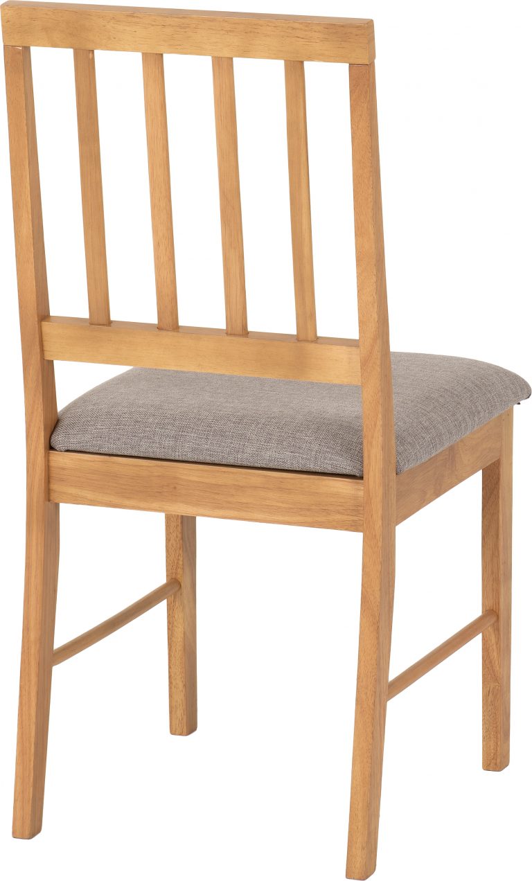 Austin dining chair with a gray cushion on a white background
