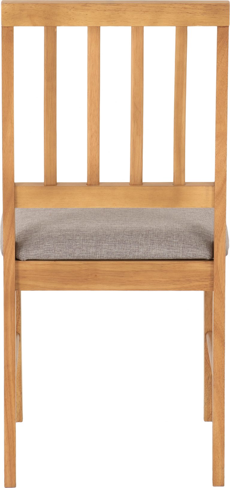 Austin dining chair with a gray cushion on a white background