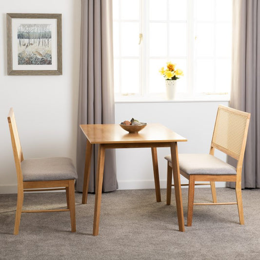 Austin & Ellis 1+2 Dining Bench Set -wooden table and chairs in a room with curtains and a painting.