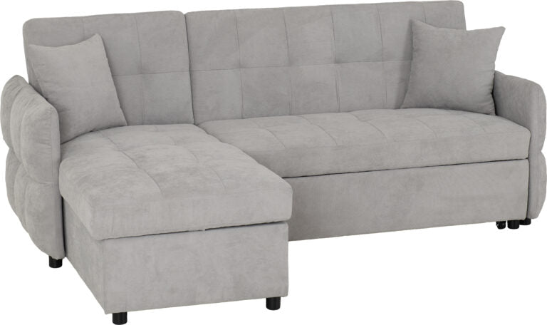 Gray sectional sofa with ottoman on a white background