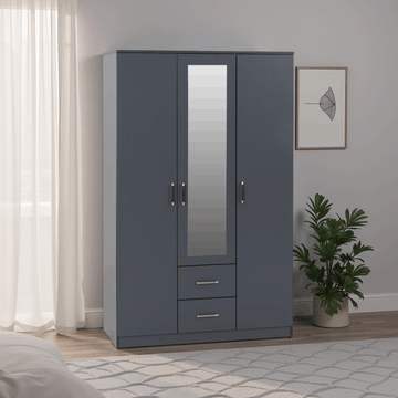 Dakota grey wardrobe with a mirror in a bedroom setting
