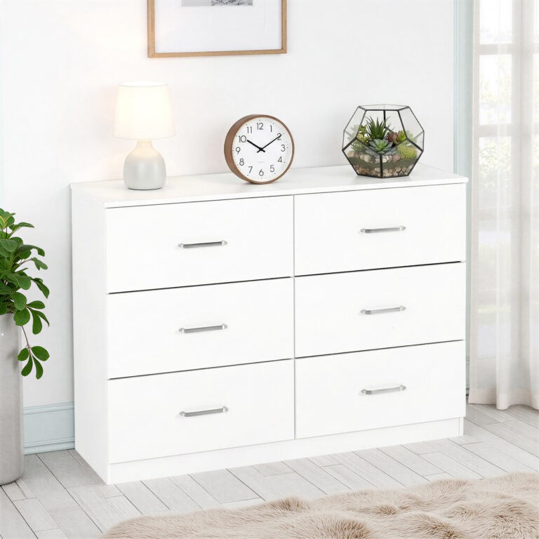 Dakota 6 Drawer Chest -White dresser with decorative items in a room setting
