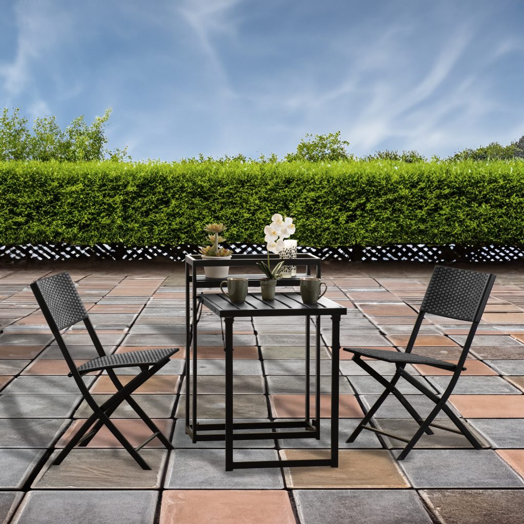 Outdoor patio set with table and chairs on a tiled patio area.