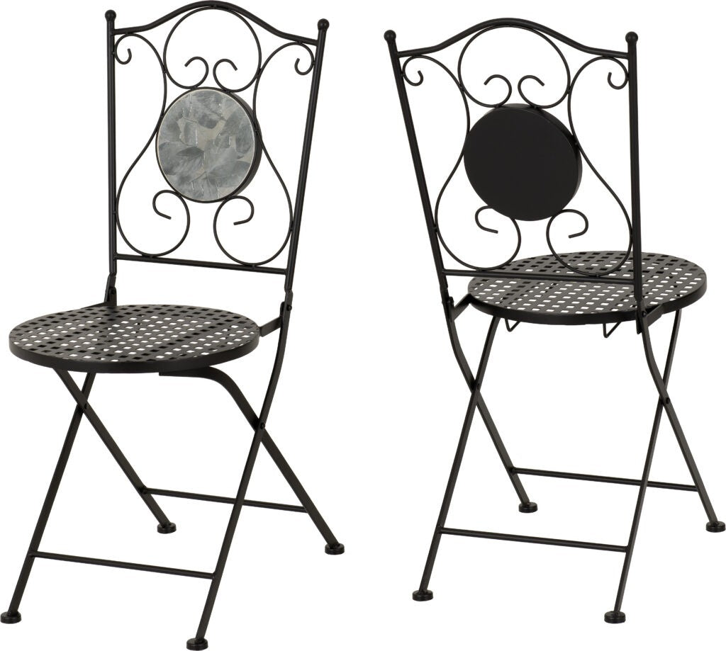 Two black metal folding chairs with decorative designs on a white background