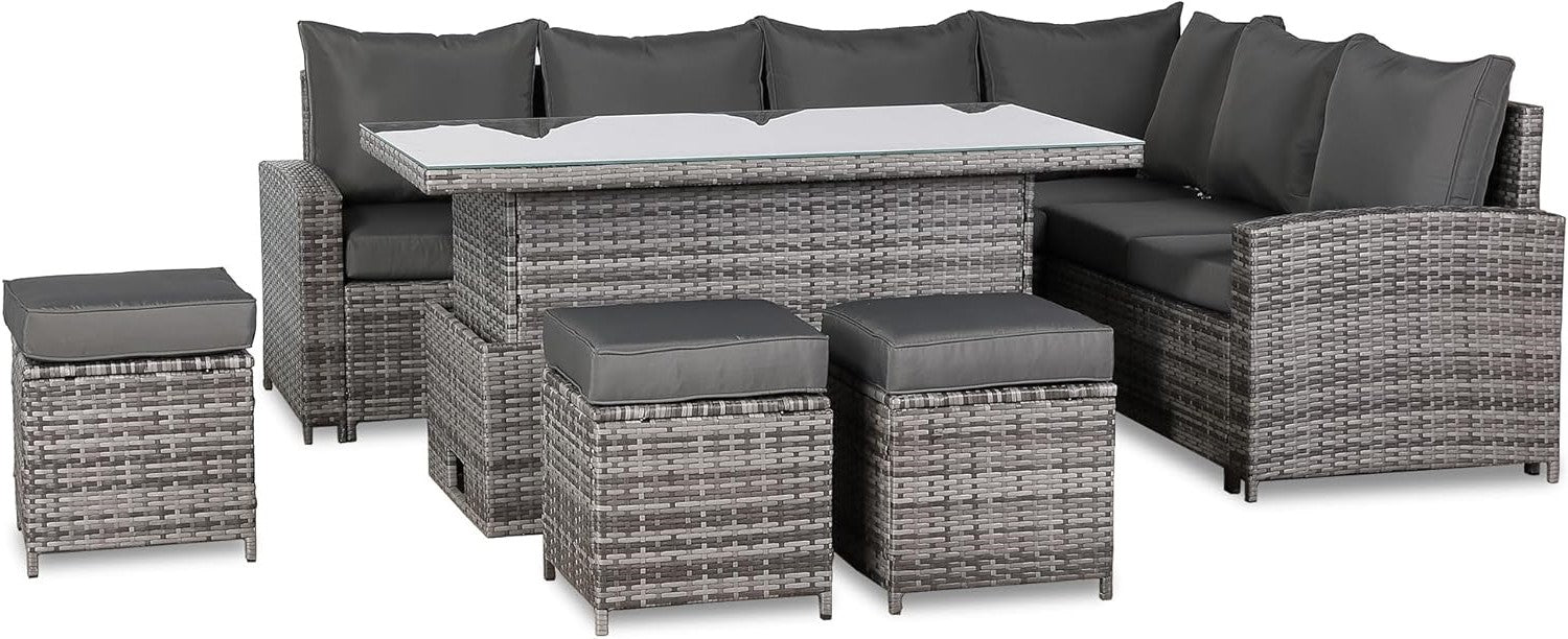 Outdoor furniture set with gray wicker chairs and ottomans on a white background