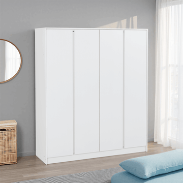 White wardrobe in a room with a gray wall, wicker basket, and light blue cushion.