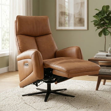 Prestige Brown leather recliner chair in a living room setting with a plant and table.