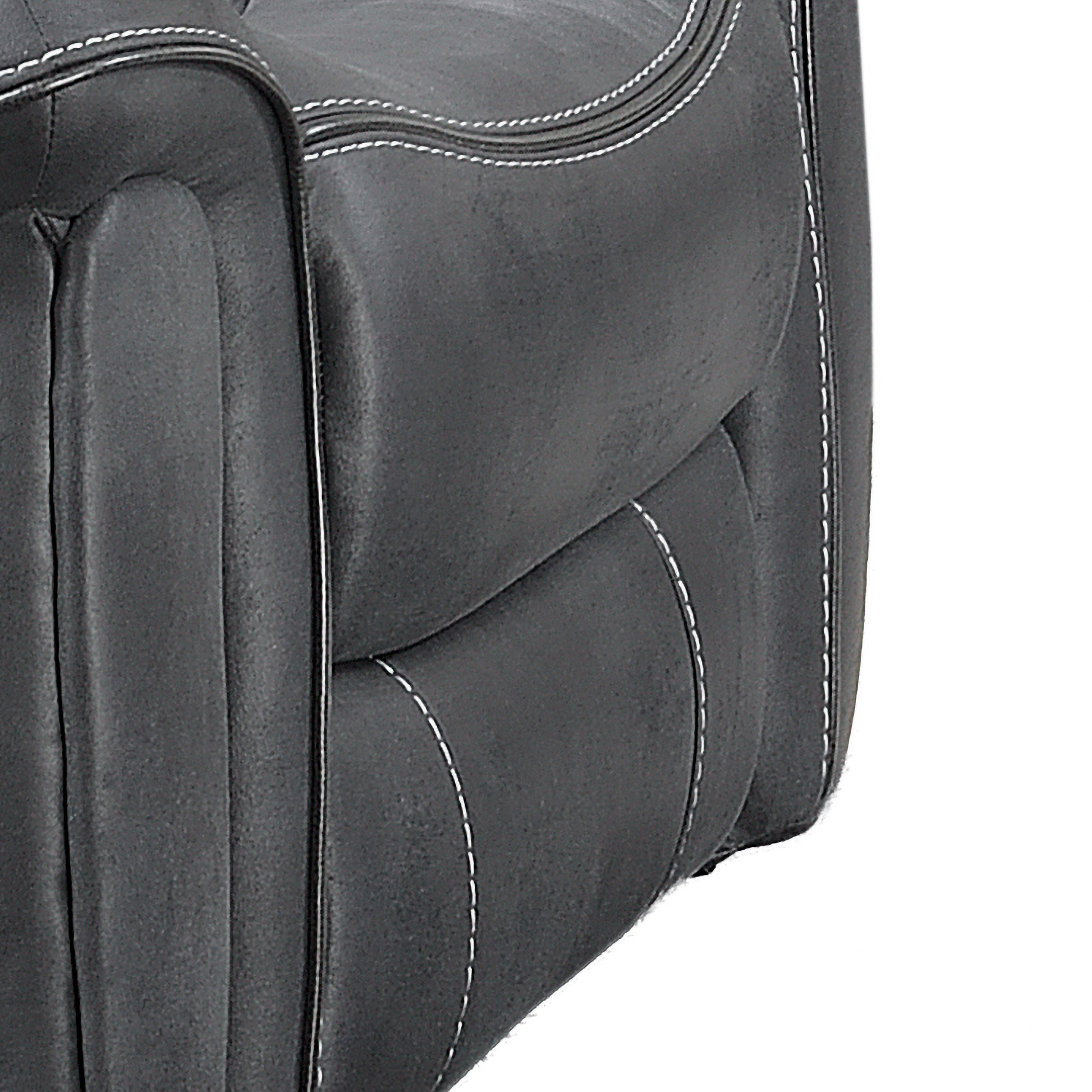 Close-up of a dark gray leather or faux-leather upholstered chair or sofa corner with visible white contrast stitching on a white background.
