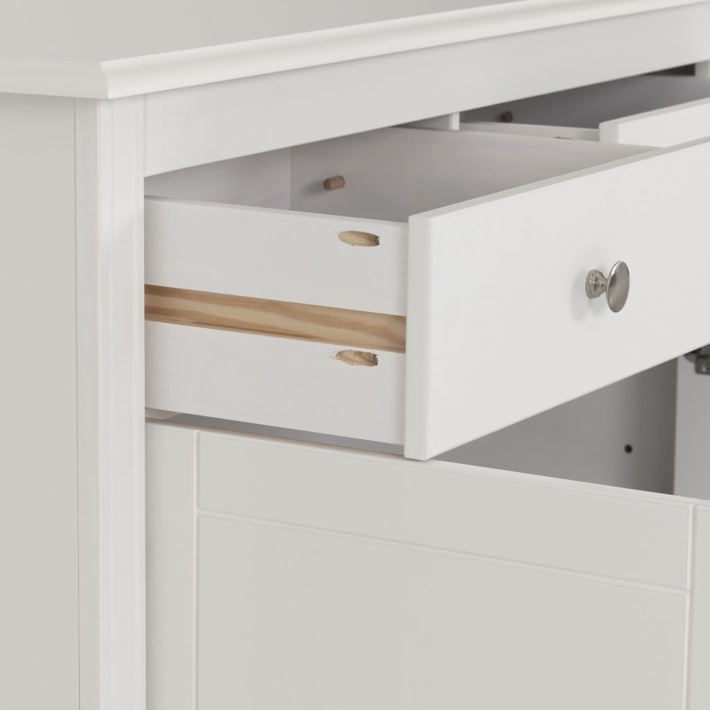White cabinet with open drawer revealing wooden interior