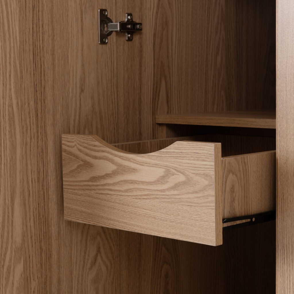Wooden wardrobe with an open drawer