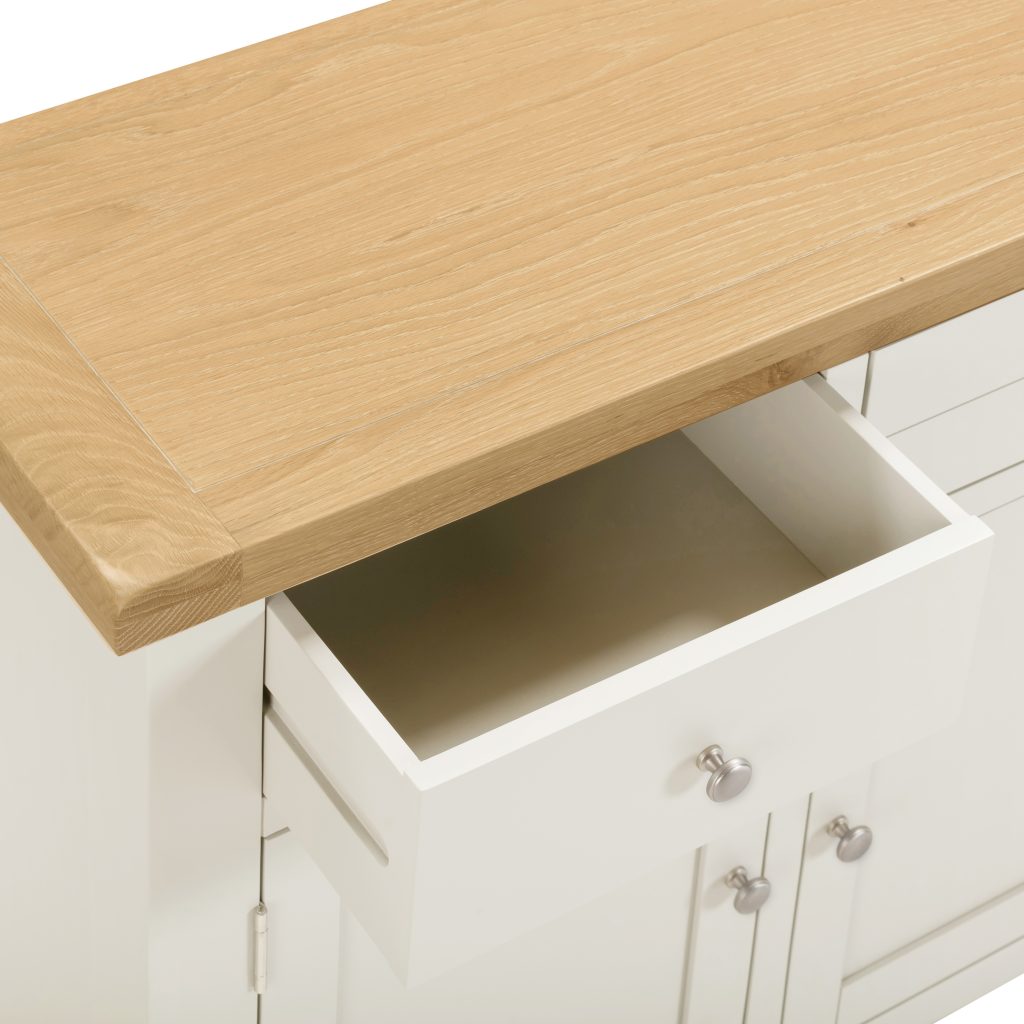 Wooden sideboard with an open cabinet below on a white background