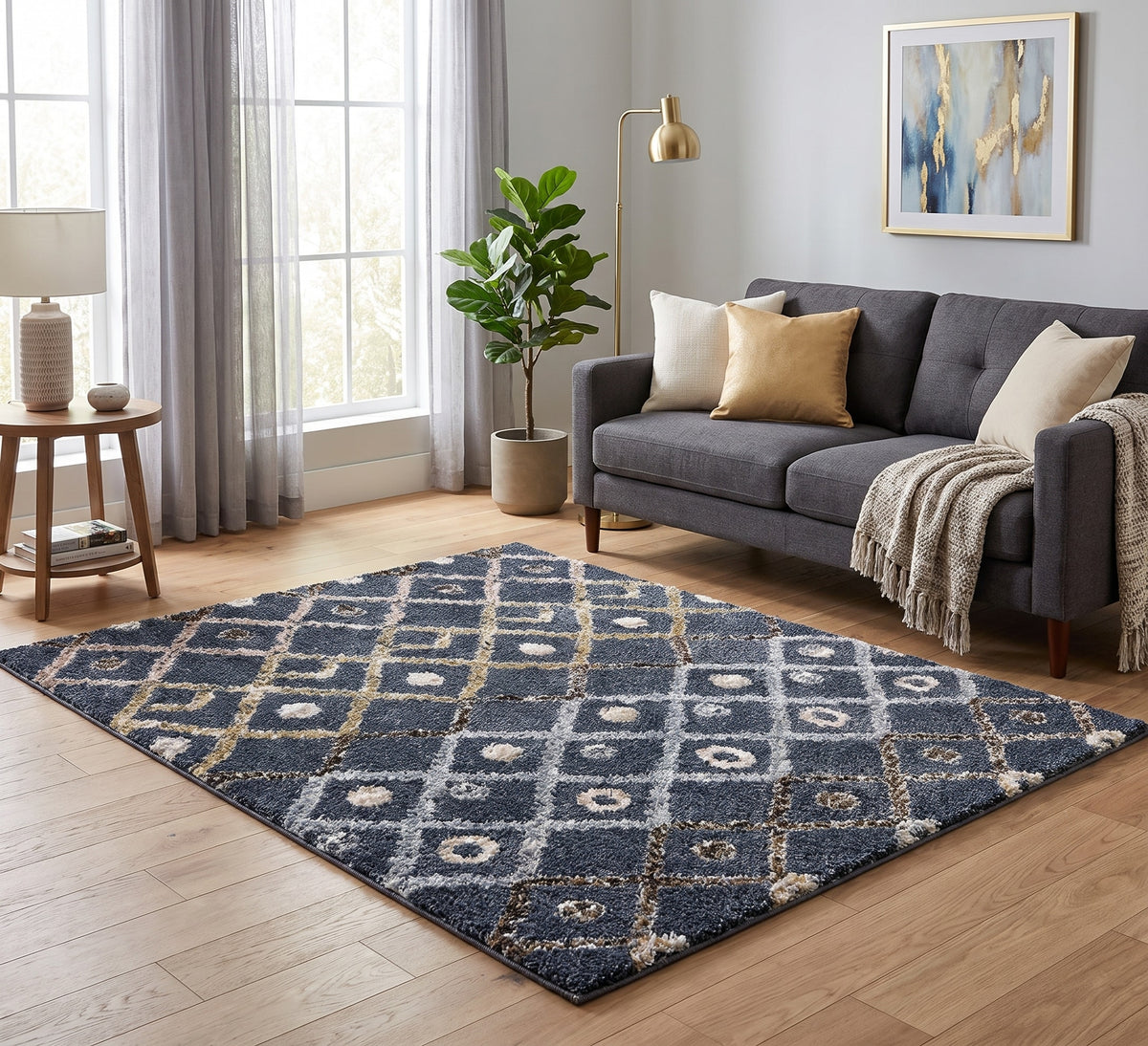 Alaska 4 dark grey diamond-pattern rug on a wooden floor in front of a dark grey sofa