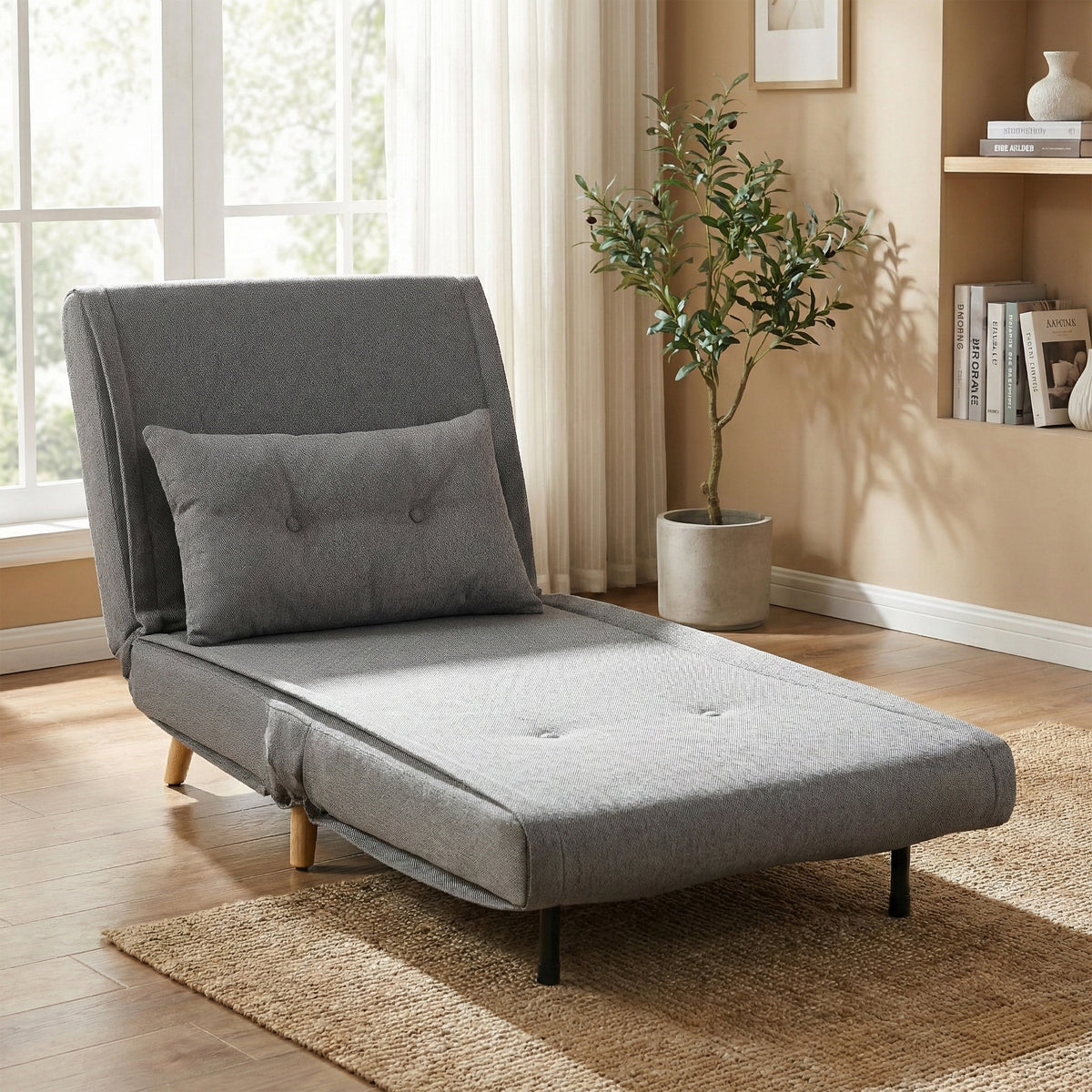 Freya Grey accent chair bed in chaise position, lifestyle setting