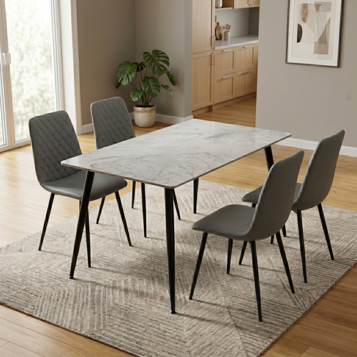 Argenta Dark Grey dining chairs around a dining table