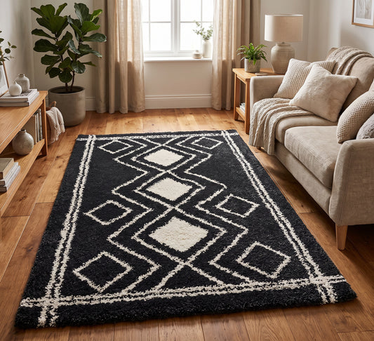 Ashton Rug - Grey 05, dark grey rug with cream diamonds beside a beige sofa