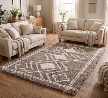 Ashton Rug - Taupe Beige, taupe and beige diamond-pattern rug between cream sofas on a wooden floor