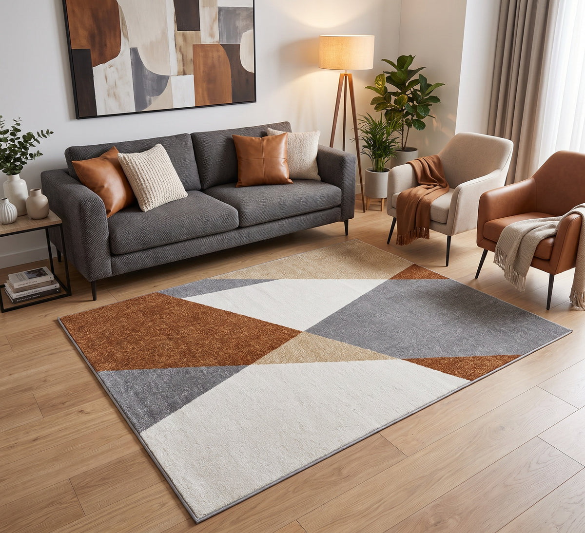 Aspire Rug - 107, rust, grey and cream geometric rug beside a grey sofa on a wooden floor