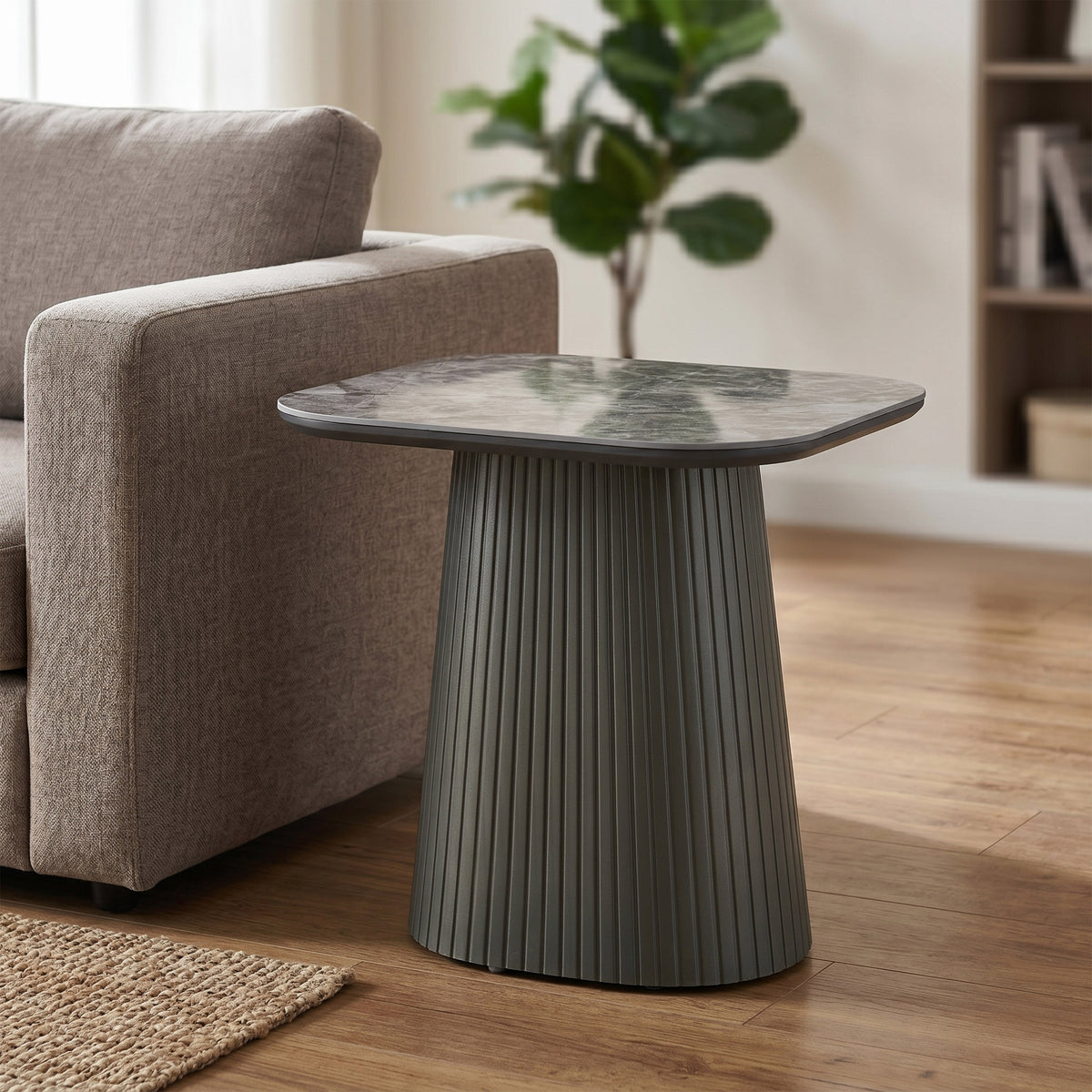 Barletta end table beside an armchair