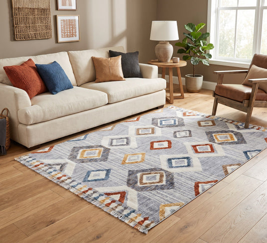 Broadway Rug - 5182A, diamond-pattern rug beside a cream sofa and wooden armchair