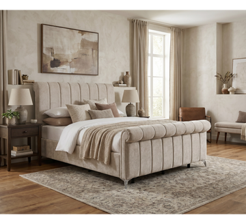 Carlow Gas-Lift Bed Beige, beige upholstered bed styled with layered bedding in a neutral bedroom