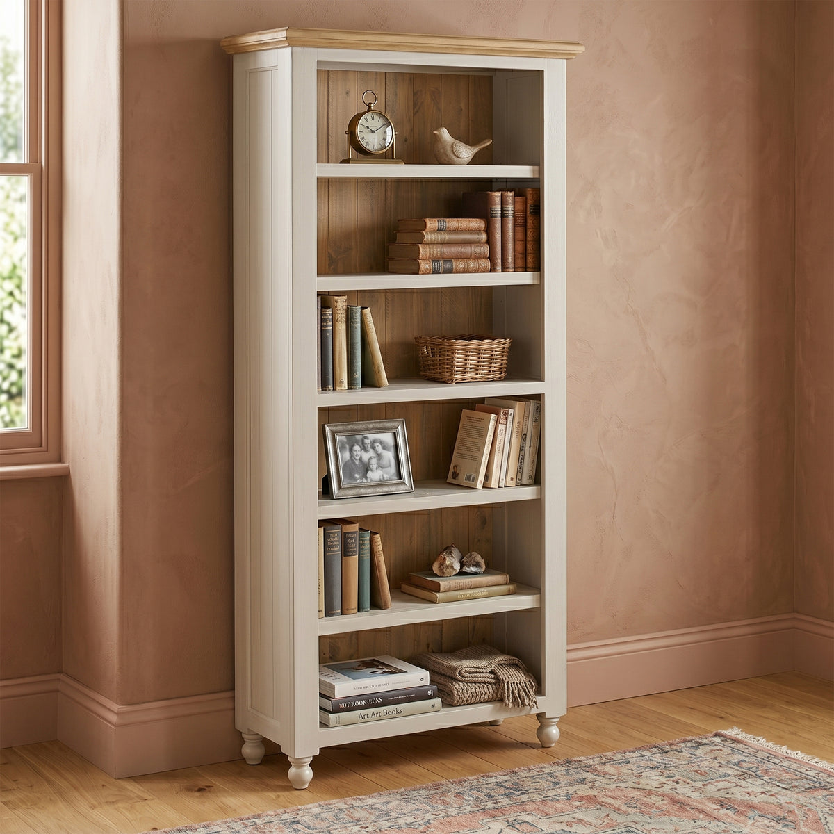 Chateau grey painted large pine bookcase in a room setting