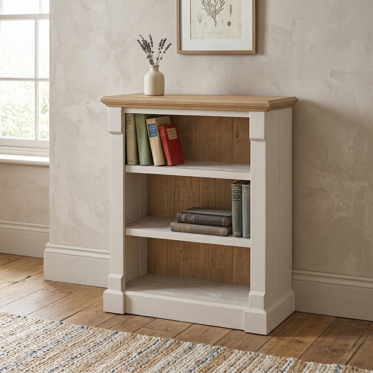 Chateau grey painted low pine bookcase in an alternative room setting