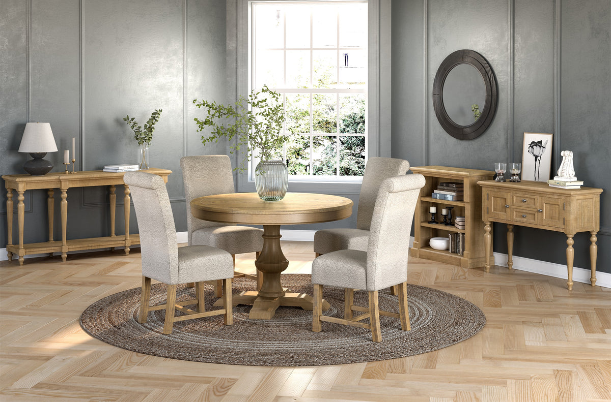 Chateau Rustic round dining set with four beige chairs, room setting