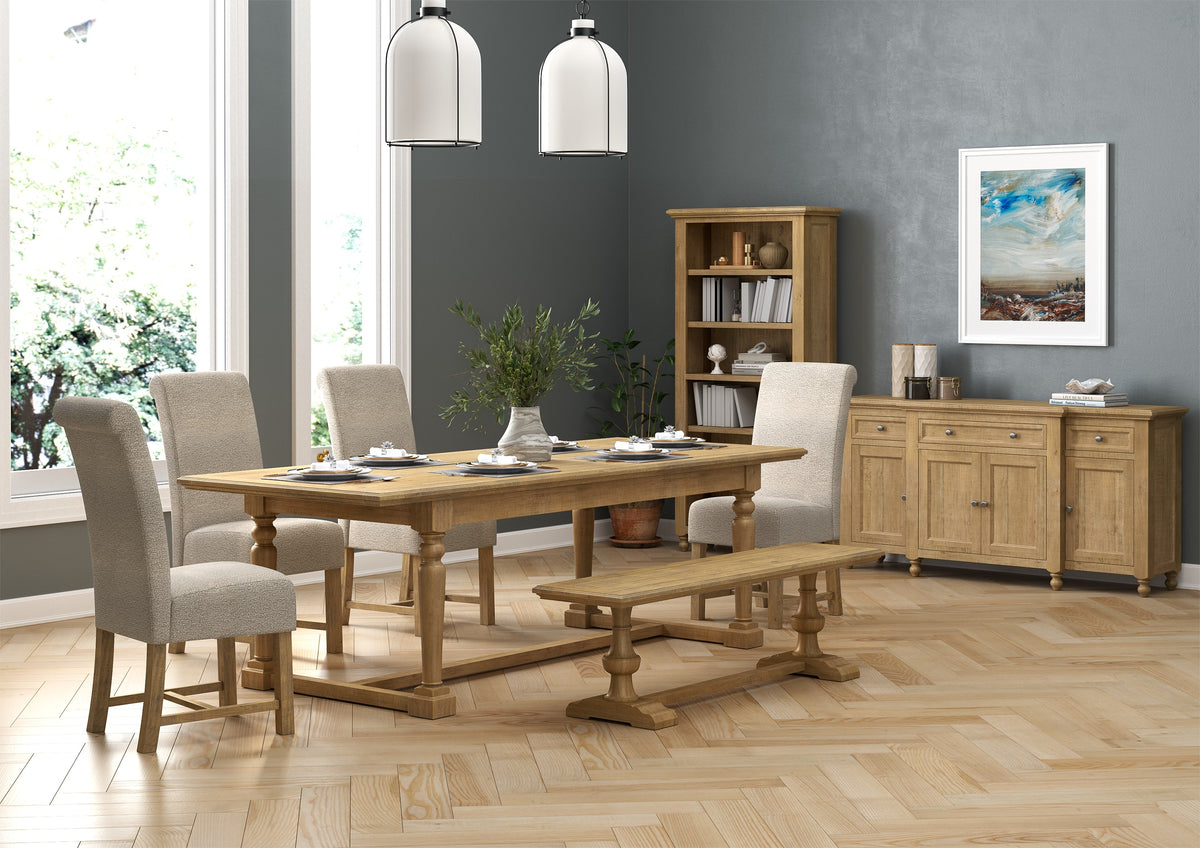 Chateau Rustic extending dining set with beige chairs and matching bench, room setting
