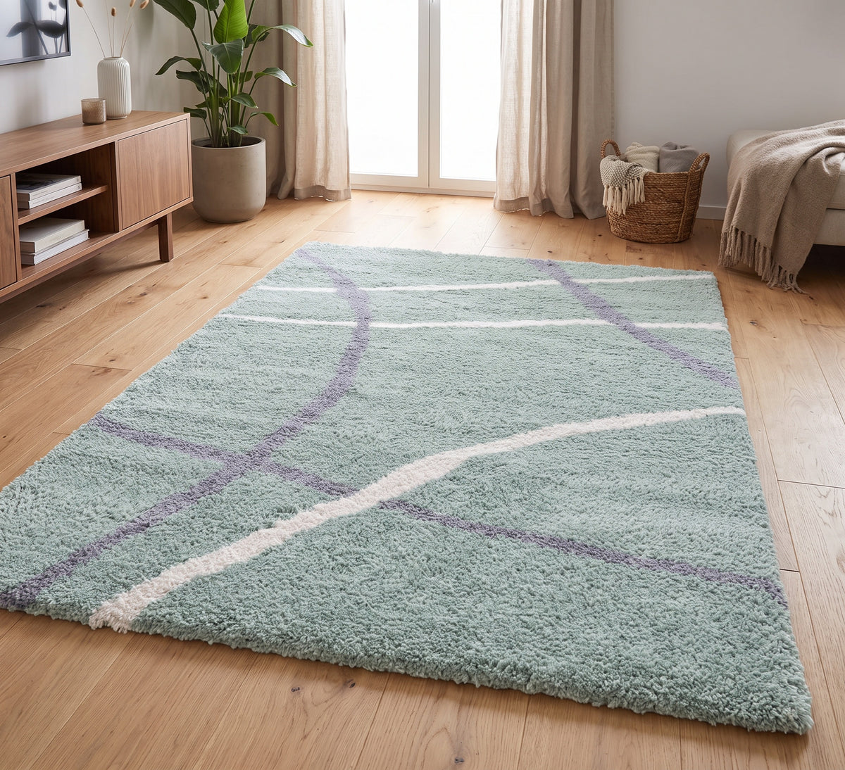 Cruz Rug - Green, green rug with curved cream and grey lines in a bright living room