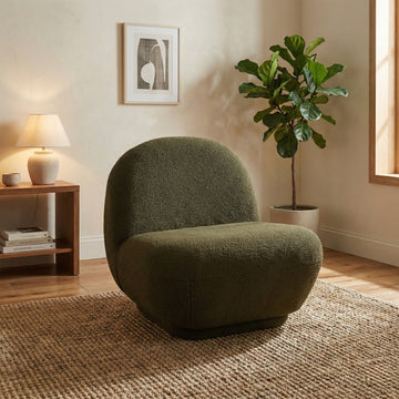 Maisie Green fabric accent chair in a styled room