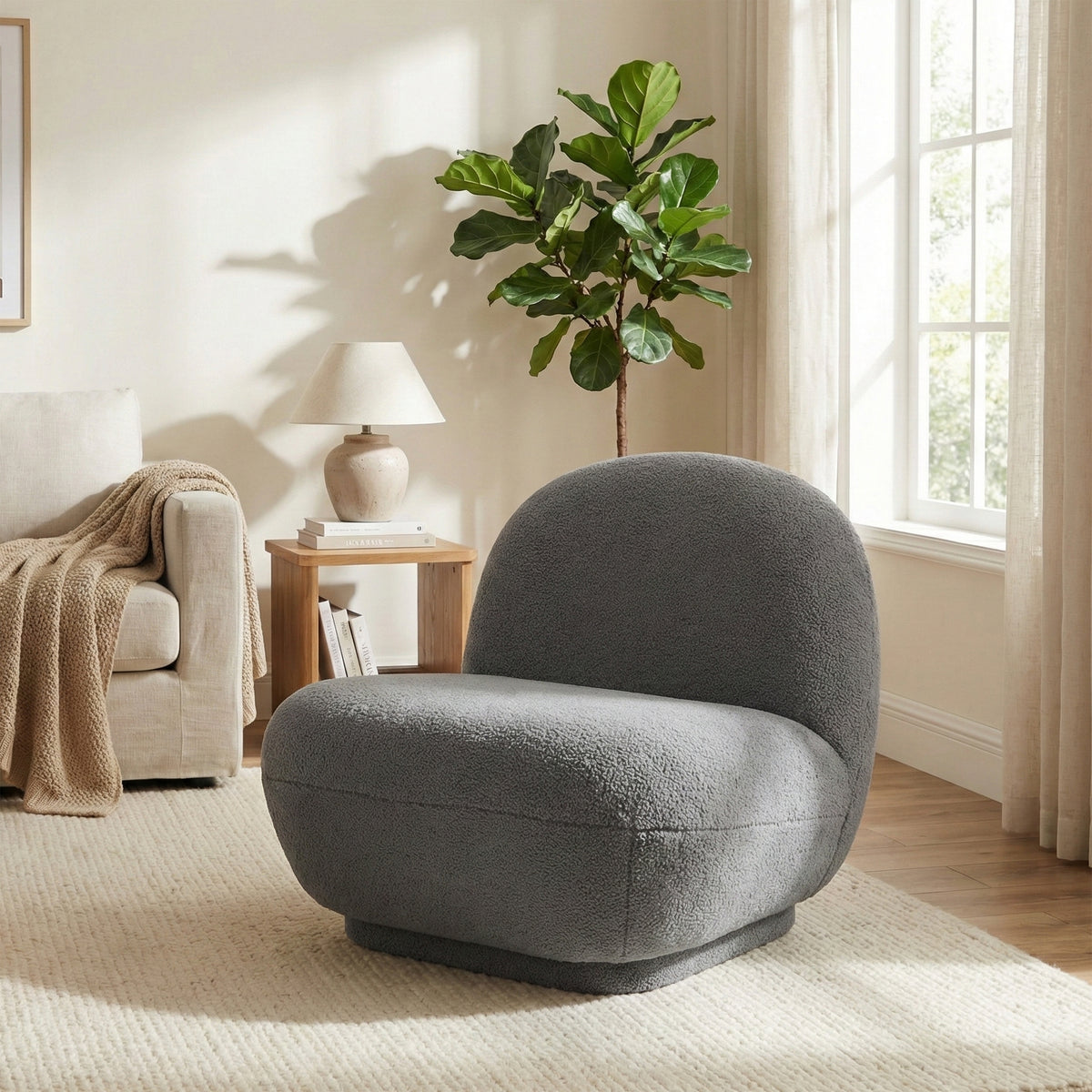 Maisie Grey fabric accent chair in a styled room