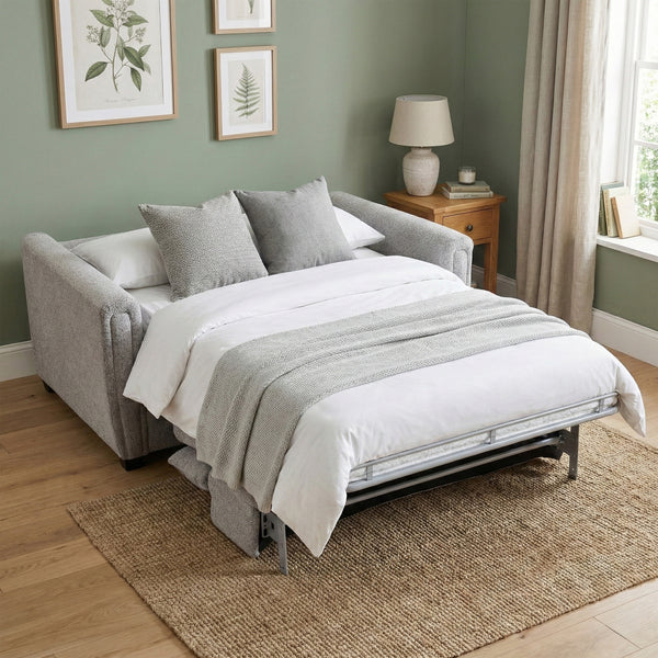 Mayfair 2 seater pull-out sofa bed in ash, living room open bed styled with bedding