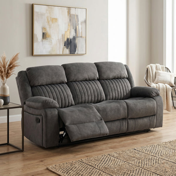 Morgan 3 Seater Manual Recliner Sofa in Iron, in a living room setting with a footrest extended