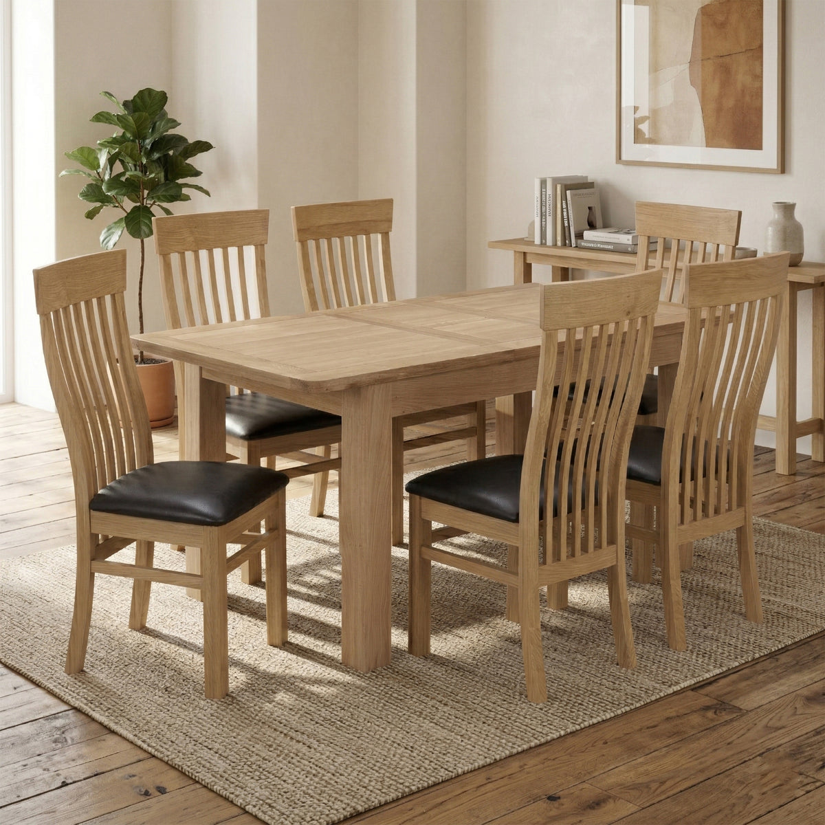 Treviso 120-160 cm oak extending dining table with six chairs in a room setting