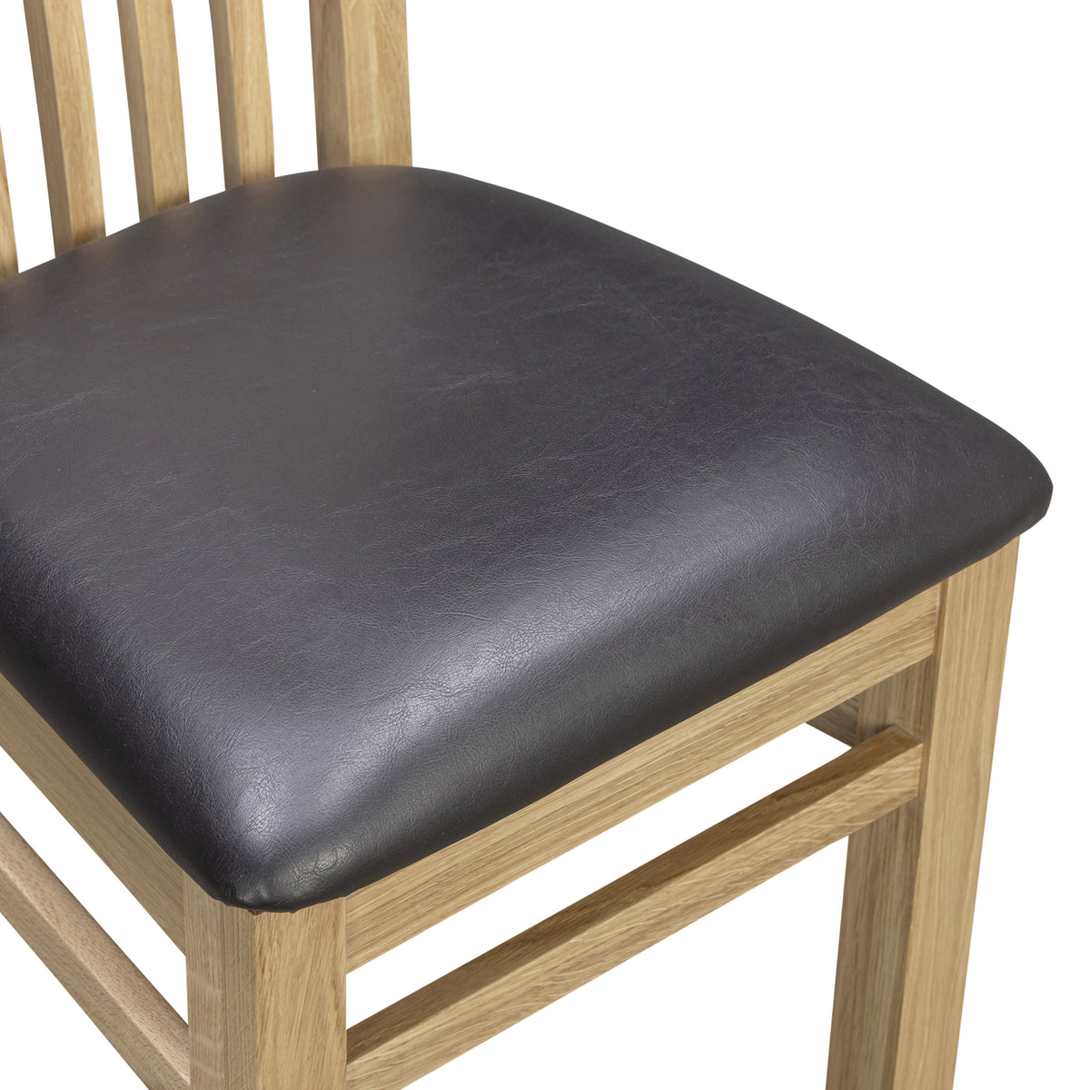 Treviso oak dining black upholstered seat detail