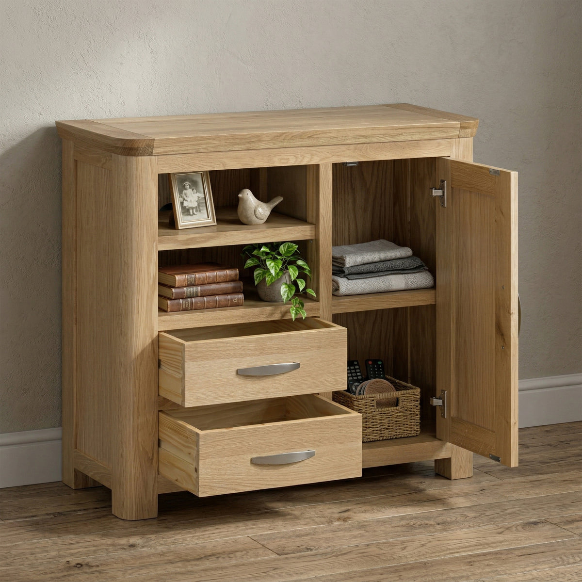 Treviso oak Media Sideboard, room setting with storage open