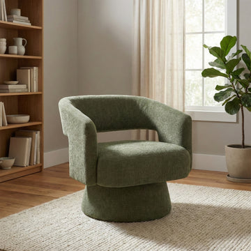Orla Green fabric swivel accent chair in a styled room
