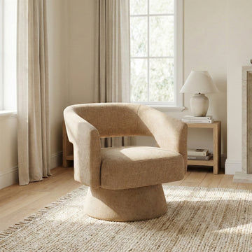 Orla Oatmeal fabric swivel accent chair in a styled room