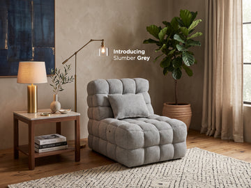 Slumber Charcoal Grey fabric electric massage chair in a styled room