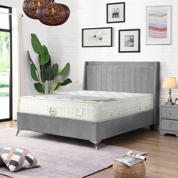 G09 Luxury High Mattress, mattress on a grey upholstered bed in a bedroom