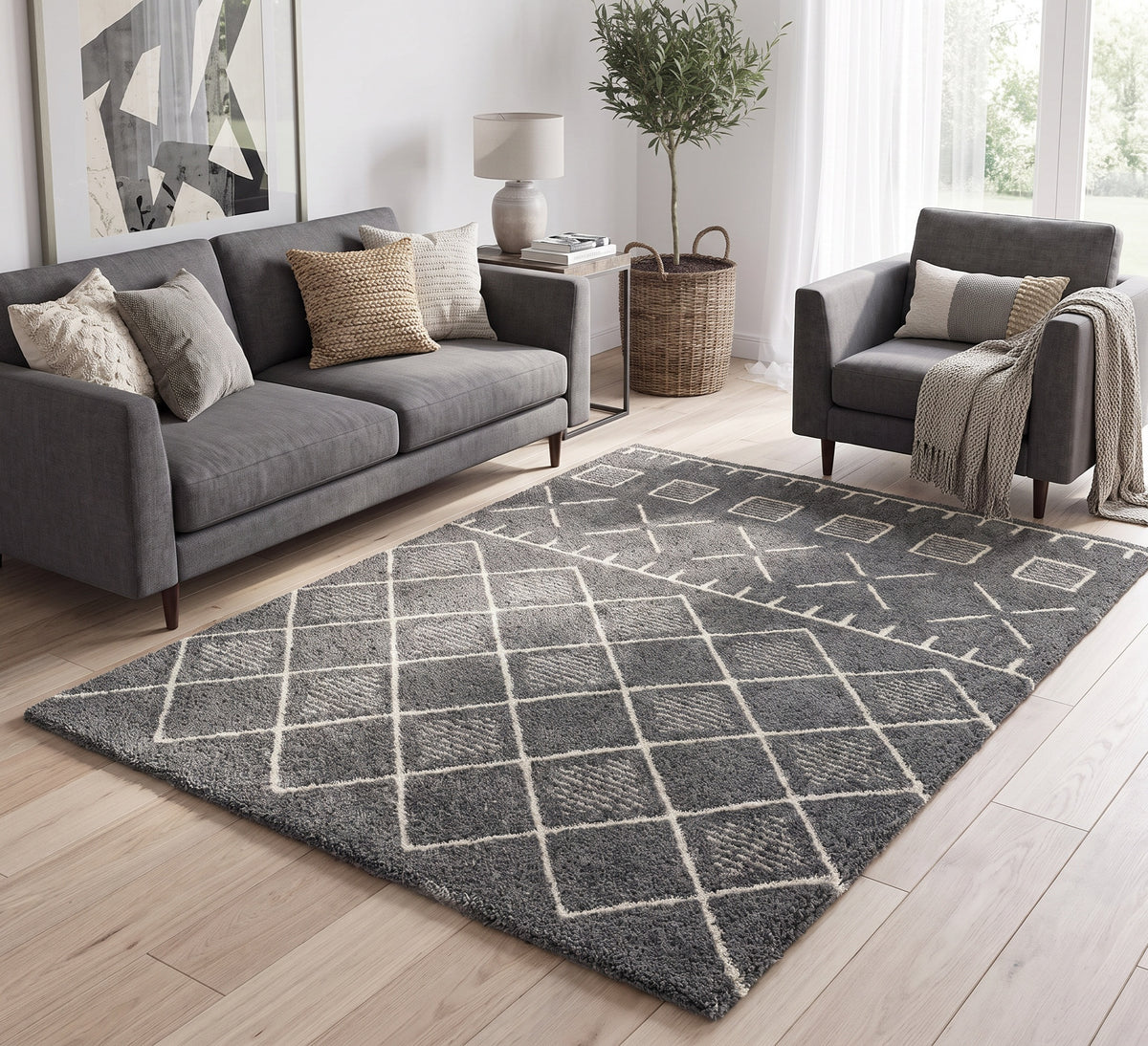 Harper 592 grey geometric rug in a living room with a grey sofa and armchair
