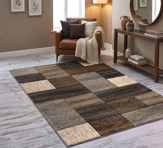 Jasper beige and brown block-pattern rug beside an armchair and console table