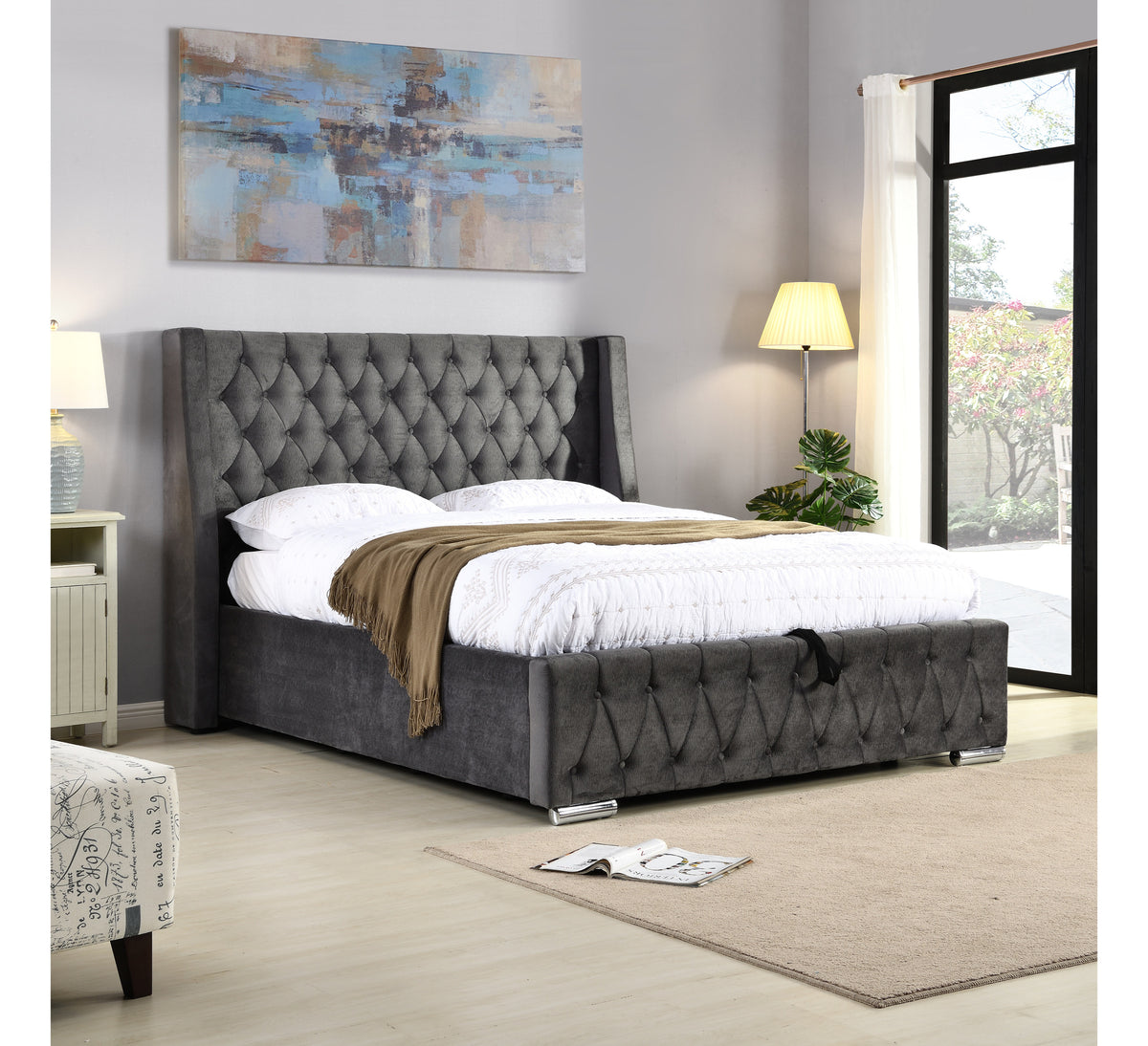 Jersey dark grey tufted bed with white bedding and a brown throw, angled room view