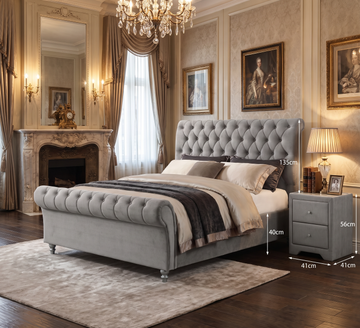 Kilkenny silver tufted bed styled in a bedroom with a chandelier and fireplace