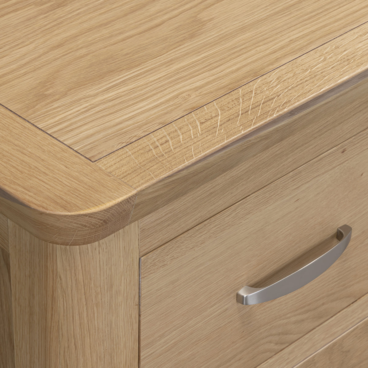 Treviso Oak 3 Over 4 Drawer Chest, curved top detail